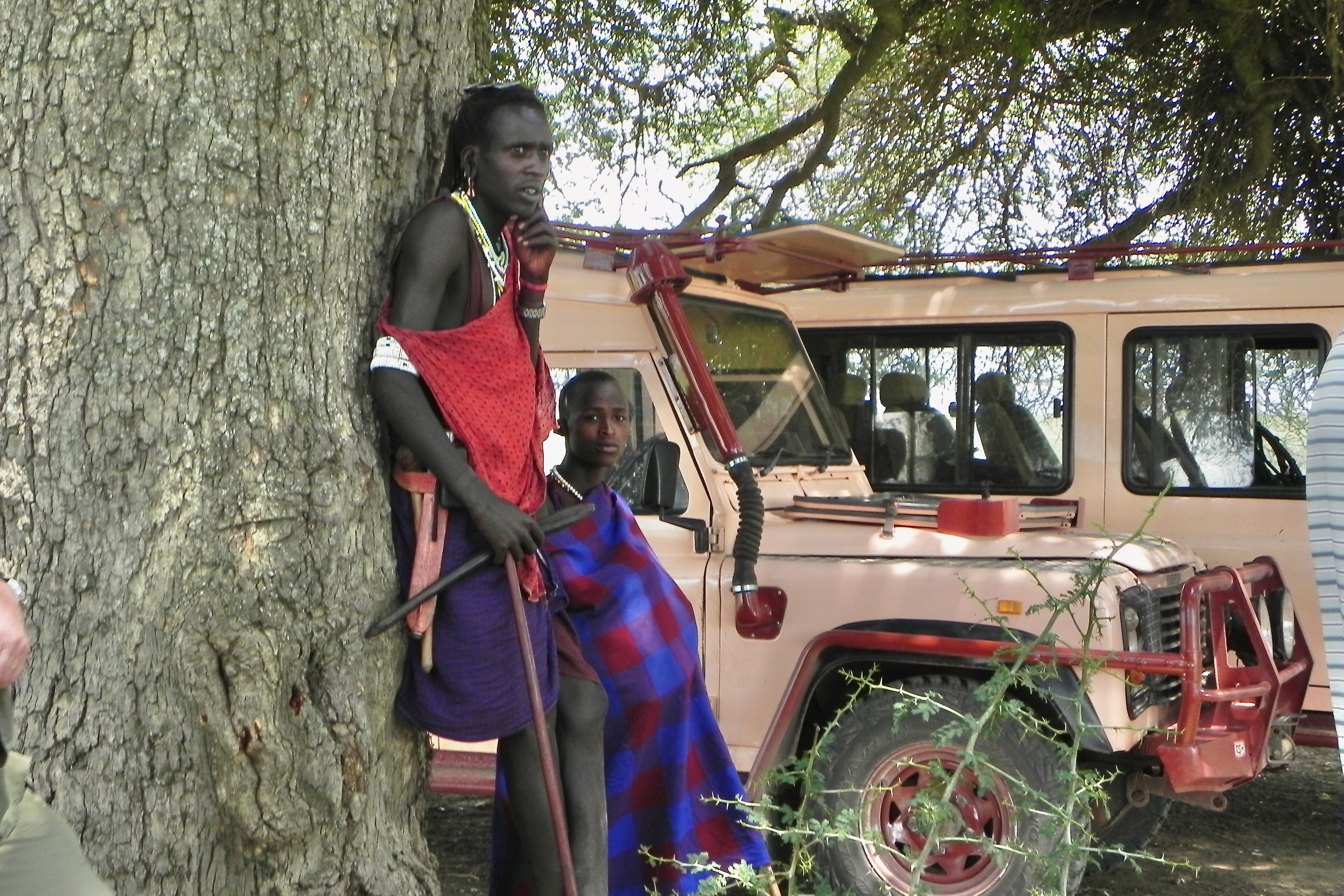 Maasai Warrior with Lion Club and Cell Phone