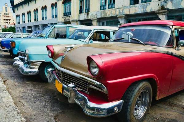 Classic Cars in a row, Havana, Visit Cuba