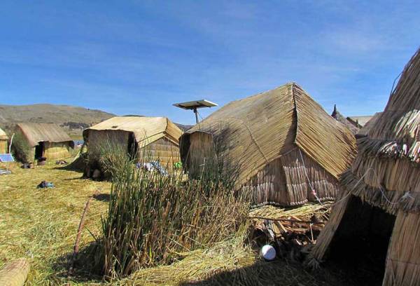Solar Panel and Reed Shelters, Uros Islands Tour